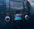 Красный Ниссан Жук, объемом двигателя 1.6 л и пробегом 85 тыс. км за 14490 $, фото 25 на Automoto.ua