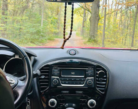 Красный Ниссан Жук, объемом двигателя 1.6 л и пробегом 25 тыс. км за 18000 $, фото 8 на Automoto.ua