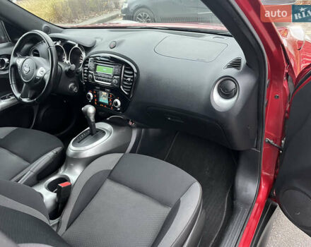 Красный Ниссан Жук, объемом двигателя 1.6 л и пробегом 76 тыс. км за 13399 $, фото 26 на Automoto.ua