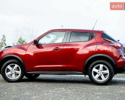 Червоний Ніссан Жук, об'ємом двигуна 1.6 л та пробігом 52 тис. км за 14400 $, фото 5 на Automoto.ua