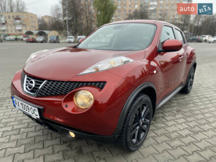 Красный Ниссан Жук, объемом двигателя 1.6 л и пробегом 119 тыс. км за 11000 $, фото 1 на Automoto.ua