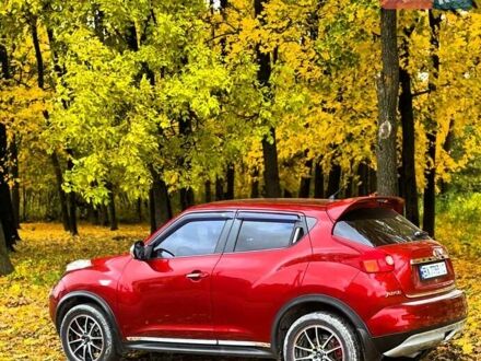 Красный Ниссан Жук, объемом двигателя 1.62 л и пробегом 131 тыс. км за 9900 $, фото 1 на Automoto.ua