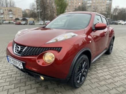 Червоний Ніссан Жук, об'ємом двигуна 1.6 л та пробігом 119 тис. км за 10500 $, фото 1 на Automoto.ua