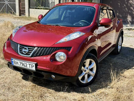 Червоний Ніссан Жук, об'ємом двигуна 1.6 л та пробігом 152 тис. км за 10700 $, фото 1 на Automoto.ua