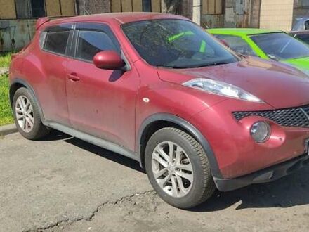 Красный Ниссан Жук, объемом двигателя 1.6 л и пробегом 175 тыс. км за 11000 $, фото 1 на Automoto.ua