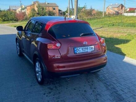 Красный Ниссан Жук, объемом двигателя 1.6 л и пробегом 105 тыс. км за 11450 $, фото 1 на Automoto.ua