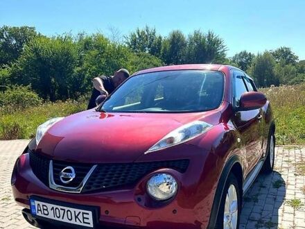 Червоний Ніссан Жук, об'ємом двигуна 1.6 л та пробігом 125 тис. км за 9700 $, фото 1 на Automoto.ua