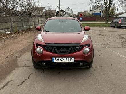 Красный Ниссан Жук, объемом двигателя 1.6 л и пробегом 214 тыс. км за 9000 $, фото 1 на Automoto.ua