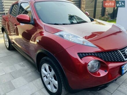 Красный Ниссан Жук, объемом двигателя 1.6 л и пробегом 125 тыс. км за 10300 $, фото 1 на Automoto.ua