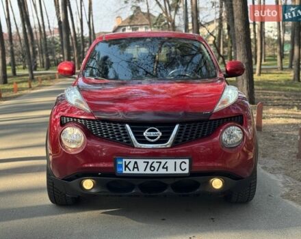 Красный Ниссан Жук, объемом двигателя 1.6 л и пробегом 130 тыс. км за 10500 $, фото 1 на Automoto.ua