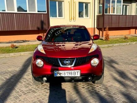 Красный Ниссан Жук, объемом двигателя 1.6 л и пробегом 95 тыс. км за 9300 $, фото 1 на Automoto.ua