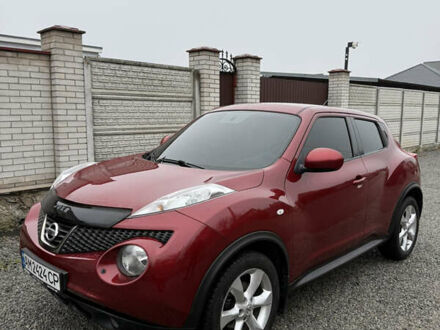 Красный Ниссан Жук, объемом двигателя 1.6 л и пробегом 93 тыс. км за 11000 $, фото 1 на Automoto.ua