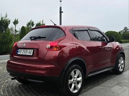 Червоний Ніссан Жук, об'ємом двигуна 1.6 л та пробігом 107 тис. км за 9300 $, фото 1 на Automoto.ua