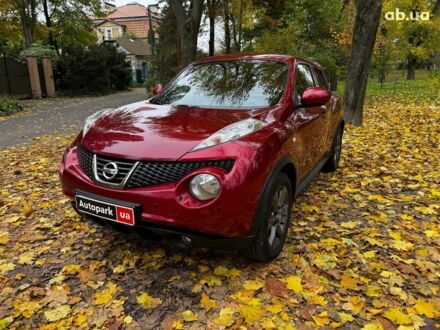 Красный Ниссан Жук, объемом двигателя 1.6 л и пробегом 131 тыс. км за 9990 $, фото 1 на Automoto.ua