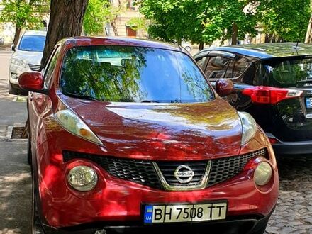 Красный Ниссан Жук, объемом двигателя 1.6 л и пробегом 168 тыс. км за 9800 $, фото 1 на Automoto.ua