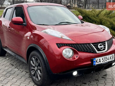 Красный Ниссан Жук, объемом двигателя 1.6 л и пробегом 152 тыс. км за 10350 $, фото 1 на Automoto.ua