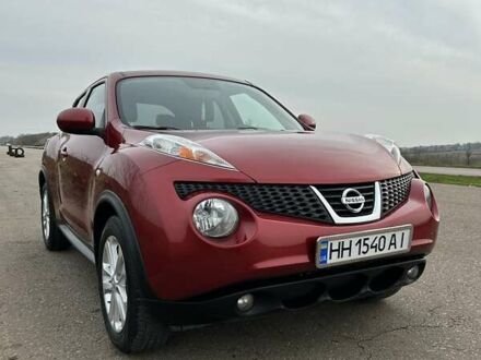 Красный Ниссан Жук, объемом двигателя 1.6 л и пробегом 219 тыс. км за 10200 $, фото 1 на Automoto.ua