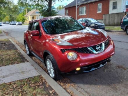Красный Ниссан Жук, объемом двигателя 1.6 л и пробегом 74 тыс. км за 6900 $, фото 1 на Automoto.ua