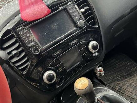 Красный Ниссан Жук, объемом двигателя 1.46 л и пробегом 130 тыс. км за 3500 $, фото 1 на Automoto.ua