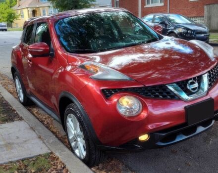 Красный Ниссан Жук, объемом двигателя 1.6 л и пробегом 75 тыс. км за 8900 $, фото 1 на Automoto.ua