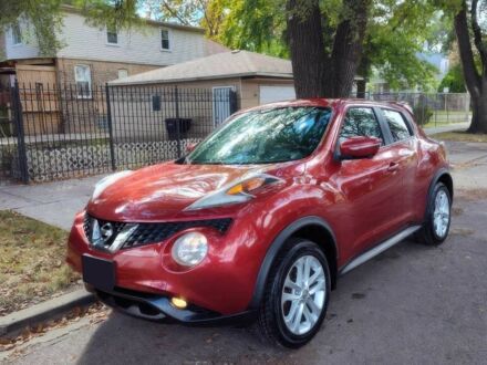 Червоний Ніссан Жук, об'ємом двигуна 1.6 л та пробігом 70 тис. км за 6000 $, фото 1 на Automoto.ua