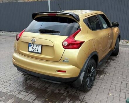 Желтый Ниссан Жук, объемом двигателя 1.6 л и пробегом 168 тыс. км за 9700 $, фото 1 на Automoto.ua