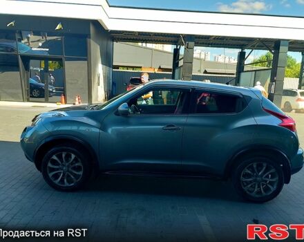 Сірий Ніссан Жук, об'ємом двигуна 1.6 л та пробігом 106 тис. км за 11000 $, фото 4 на Automoto.ua