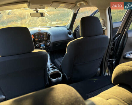 Серый Ниссан Жук, объемом двигателя 1.6 л и пробегом 100 тыс. км за 12500 $, фото 16 на Automoto.ua