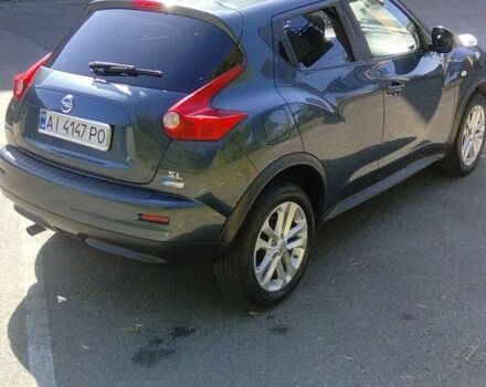 Синий Ниссан Жук, объемом двигателя 1.6 л и пробегом 204 тыс. км за 8800 $, фото 1 на Automoto.ua