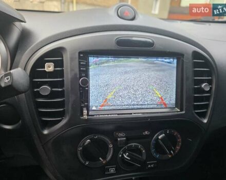 Синий Ниссан Жук, объемом двигателя 1.6 л и пробегом 120 тыс. км за 8000 $, фото 9 на Automoto.ua