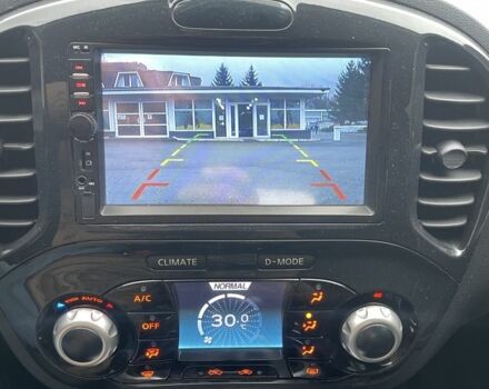 Синий Ниссан Жук, объемом двигателя 1.6 л и пробегом 65 тыс. км за 6250 $, фото 5 на Automoto.ua