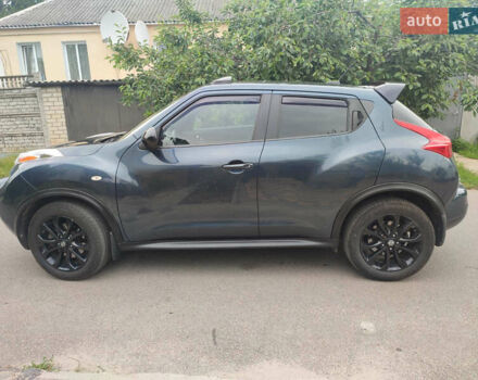 Синий Ниссан Жук, объемом двигателя 1.62 л и пробегом 148 тыс. км за 9700 $, фото 2 на Automoto.ua