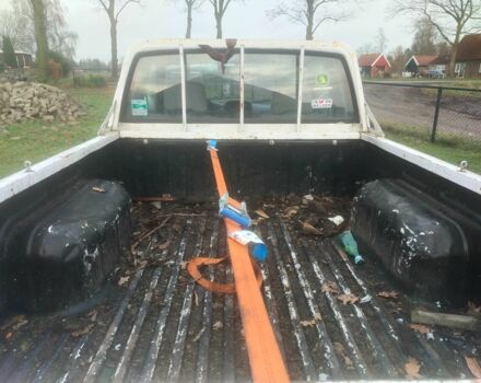 Белый Ниссан Кинг Каб, объемом двигателя 2.5 л и пробегом 256 тыс. км за 5365 $, фото 6 на Automoto.ua