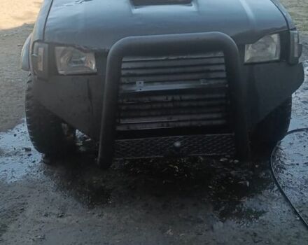 Чорний Ніссан Кінг Каб, об'ємом двигуна 2.5 л та пробігом 300 тис. км за 3738 $, фото 1 на Automoto.ua
