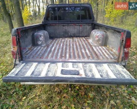 Красный Ниссан Кинг Каб, объемом двигателя 2.4 л и пробегом 400 тыс. км за 6000 $, фото 6 на Automoto.ua