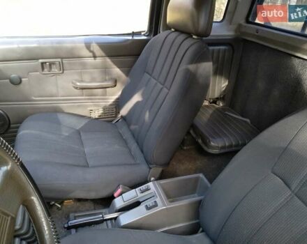 Красный Ниссан Кинг Каб, объемом двигателя 2.4 л и пробегом 400 тыс. км за 6000 $, фото 11 на Automoto.ua