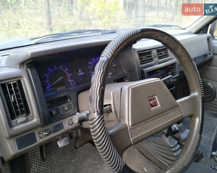 Красный Ниссан Кинг Каб, объемом двигателя 2.4 л и пробегом 400 тыс. км за 6000 $, фото 9 на Automoto.ua