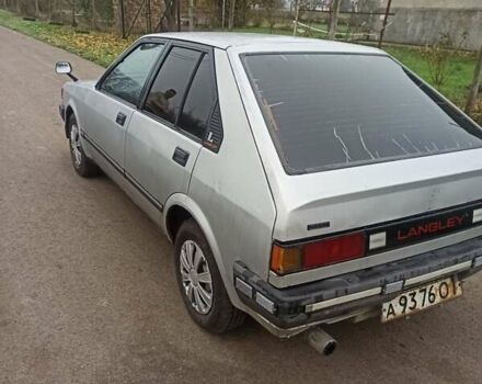 Серый Ниссан Лэнгли, объемом двигателя 0 л и пробегом 160 тыс. км за 1500 $, фото 1 на Automoto.ua