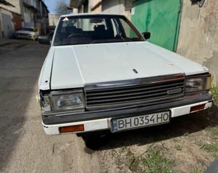 Белый Ниссан Лаурел, объемом двигателя 2 л и пробегом 170 тыс. км за 1750 $, фото 7 на Automoto.ua