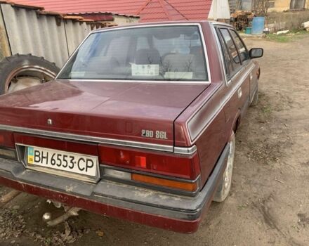 Красный Ниссан Лаурел, объемом двигателя 0 л и пробегом 100 тыс. км за 1100 $, фото 4 на Automoto.ua