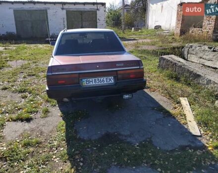Красный Ниссан Лаурел, объемом двигателя 3 л и пробегом 283 тыс. км за 1318 $, фото 4 на Automoto.ua