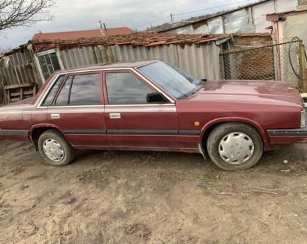 Красный Ниссан Лаурел, объемом двигателя 0 л и пробегом 100 тыс. км за 1100 $, фото 1 на Automoto.ua