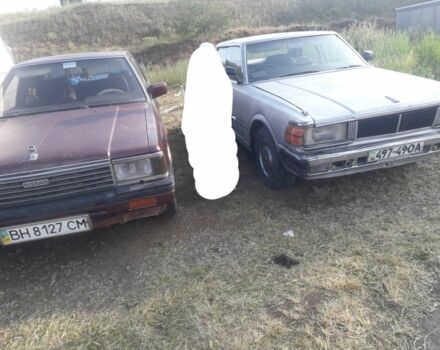 Красный Ниссан Лаурел, объемом двигателя 2.8 л и пробегом 500 тыс. км за 1300 $, фото 5 на Automoto.ua