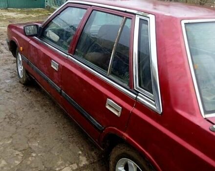 Червоний Ніссан Лаурел, об'ємом двигуна 2.8 л та пробігом 200 тис. км за 550 $, фото 3 на Automoto.ua