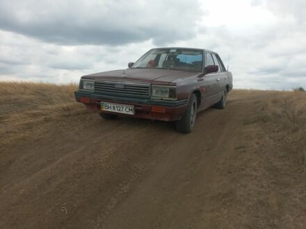 Ниссан Лаурел 1986 в Одессе на Automoto.ua Красный Ниссан Лаурел, объемом двигателя 2.8 л и пробегом 500 тыс. км за 1300 $, фото 1 на Automoto.ua