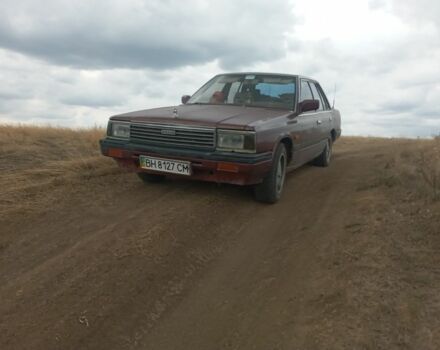 Красный Ниссан Лаурел, объемом двигателя 2.8 л и пробегом 500 тыс. км за 1300 $, фото 1 на Automoto.ua