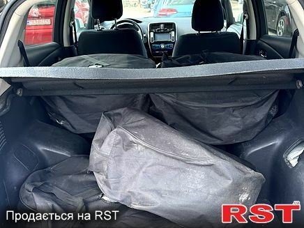 Білий Ніссан Ліф, об'ємом двигуна 80 л та пробігом 96 тис. км за 7750 $, фото 6 на Automoto.ua
