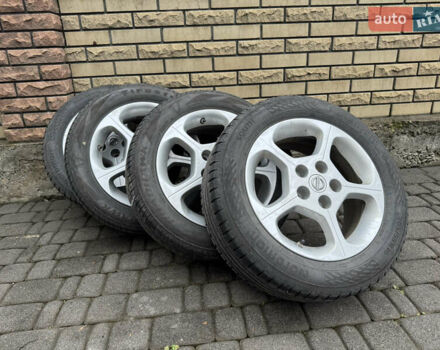 Белый Ниссан Лиф, объемом двигателя 0 л и пробегом 82 тыс. км за 6600 $, фото 20 на Automoto.ua