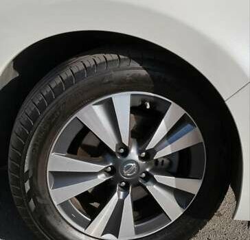 Белый Ниссан Лиф, объемом двигателя 0 л и пробегом 126 тыс. км за 10000 $, фото 12 на Automoto.ua