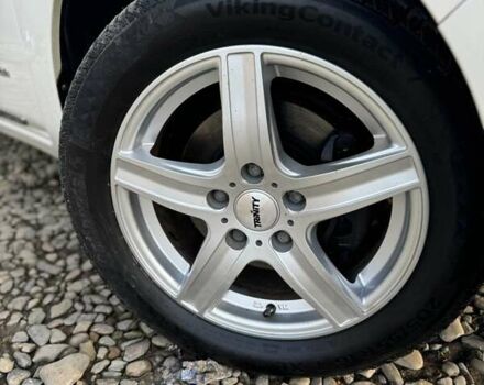 Червоний Ніссан Ліф, об'ємом двигуна 0 л та пробігом 90 тис. км за 5999 $, фото 7 на Automoto.ua